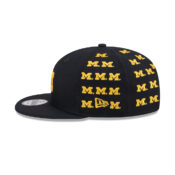 New-Era-9Fifty-University-of-Michigan-Wolverines-Sticker-Helmet-Snapback-Hat-Dark-Navy-Gold-left.jpg