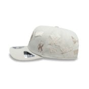 New-Era-9Seventy-Tijuana-Xolos-All-Over-LMX-Stretch-Snapback-Hat-Cream-left.jpg